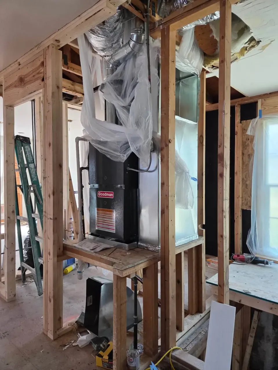 Completed furnace and coil installation — the indoor half of a dual-fuel system